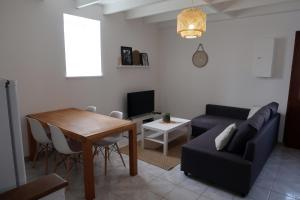 Posezení v ubytování Clermont Centre- Appartement Privé