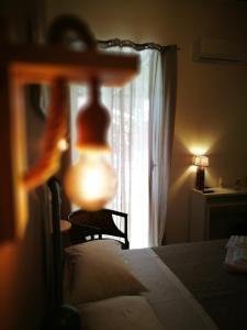 A bed or beds in a room at BELLA PALERMO