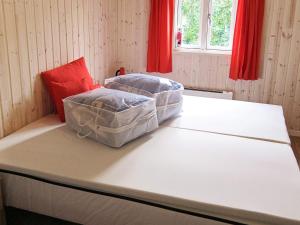 Postel nebo postele na pokoji v ubytování Holiday home Rødby XLII