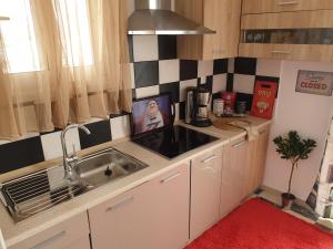 Kuchyň nebo kuchyňský kout v ubytování Charming Volos House 1