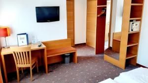TV a/nebo společenská místnost v ubytování Hotel Fabrik Wien