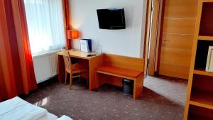 TV a/nebo společenská místnost v ubytování Hotel Fabrik Wien