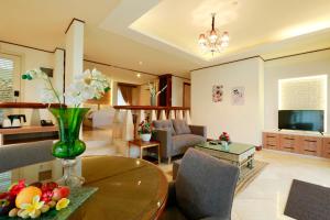 Telewizja i/lub zestaw kina domowego w obiekcie R Hotel Rancamaya