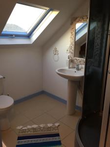 a bathroom with a shower and a sink and a mirror at French Corréze Moulin Bleu in Saint-Pantaléon-de-Larche