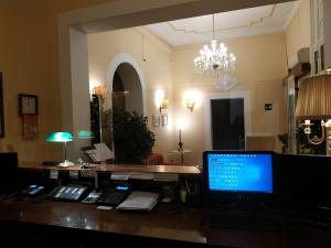 TV a/nebo společenská místnost v ubytování Hotel del Centro