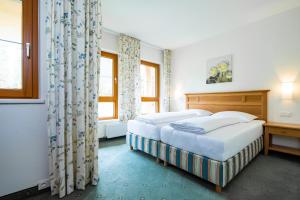Katil atau katil-katil dalam bilik di Alpenvital Tirol Appartements