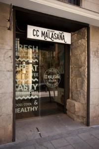 a store with a sign in the doorway of a store at CC Malasaña in Madrid