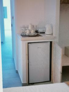 Kuchyňa alebo kuchynka v ubytovaní Afrodite Luxury Rooms