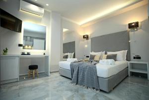Ένα ή περισσότερα κρεβάτια σε δωμάτιο στο Imagine Studios