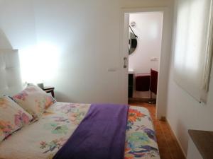 Postel nebo postele na pokoji v ubytování APARTAMENTO CAMPO SANTA BAIA
