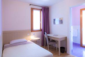 Postel nebo postele na pokoji v ubytování Agriturismo la Chiocciola
