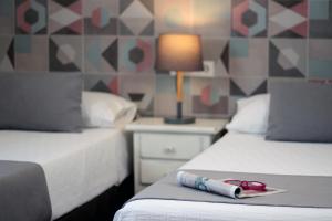 Postel nebo postele na pokoji v ubytování Apartamentos Ribera