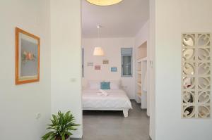 Ένα ή περισσότερα κρεβάτια σε δωμάτιο στο Nof Beresheet suites