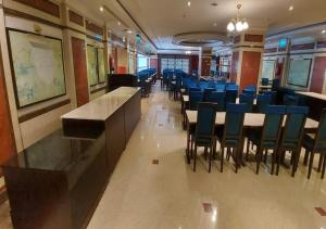 A restaurant or other place to eat at Rotana Al Mesk Hotel
