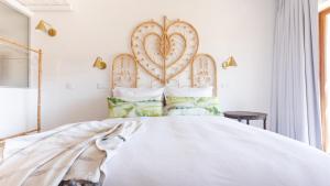 Een bed of bedden in een kamer bij Hortas do Rio - Casa de Campo