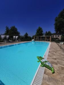 The swimming pool at or close to B&B Casazze Dream