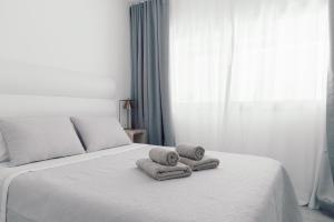 Posteľ alebo postele v izbe v ubytovaní Guirre HolidayFV
