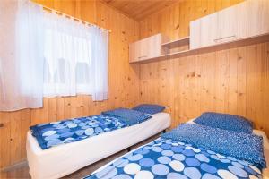 Cama o camas de una habitación en Domki SOLE