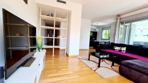 Televízia a/alebo spoločenská miestnosť v ubytovaní Forum-CCIB-Relax Flats
