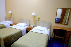 Postel nebo postele na pokoji v ubytování Araks Hotel Complex
