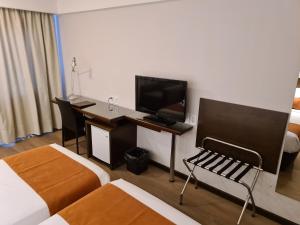TV a/nebo společenská místnost v ubytování Crystal Tower