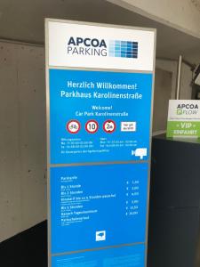 a sign for aergoco parking in a building at Moderne Appartement Hannover Centrum - City Flat HbF in Hannover