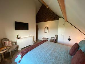 Postel nebo postele na pokoji v ubytování Madelette B&B