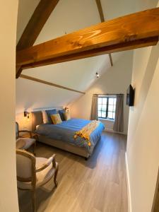 Postel nebo postele na pokoji v ubytování Madelette B&B
