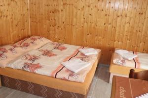 Postel nebo postele na pokoji v ubytování Hotel u Nádraží Lanžhot