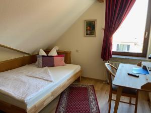 Postel nebo postele na pokoji v ubytování Hotel Janssen