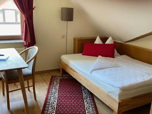Postel nebo postele na pokoji v ubytování Hotel Janssen