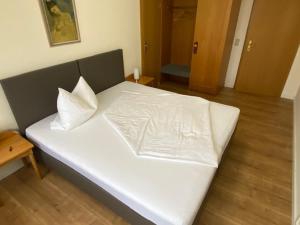 Postel nebo postele na pokoji v ubytování Hotel Janssen