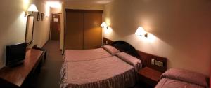 Letto o letti in una camera di Hotel Roc Del Castell
