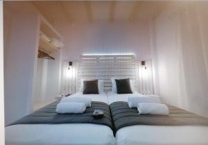 Posteľ alebo postele v izbe v ubytovaní Afrodite Luxury Rooms
