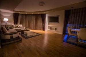 Μια τηλεόραση ή/και κέντρο ψυχαγωγίας στο Bentley Apartments