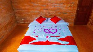 
A bed or beds in a room at Villa Mak Cik

