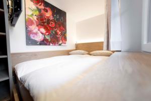 Posteľ alebo postele v izbe v ubytovaní Aparthotel Steger Wagrain