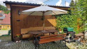 Vonkajšia záhrada v ubytovaní Aparthotel STARA PIEKARNIA by ROYAL APARTS