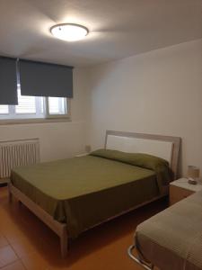 Posteľ alebo postele v izbe v ubytovaní Lomarchi Holiday Home