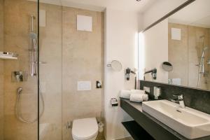 חדר רחצה ב-Vital-Hotel-Styria