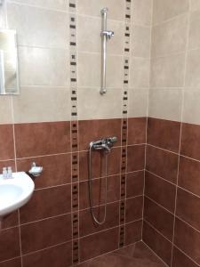 a bathroom with a shower and a sink at Time out in Sozopol +68 photos
