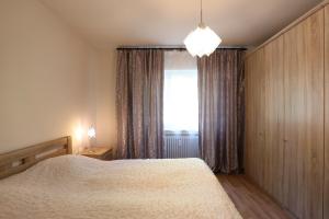 Ένα ή περισσότερα κρεβάτια σε δωμάτιο στο Love&Air&Mountains