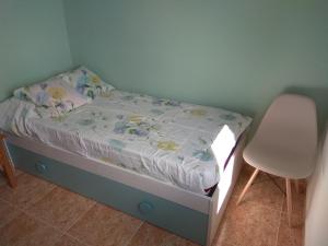 Postel nebo postele na pokoji v ubytování Casa Marisma Xacobeo