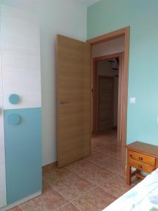 Postel nebo postele na pokoji v ubytování Casa Marisma Xacobeo