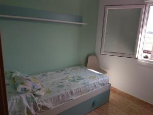 Postel nebo postele na pokoji v ubytování Casa Marisma Xacobeo