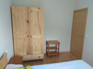 Postel nebo postele na pokoji v ubytování Casa Marisma Xacobeo