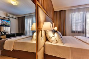 Postel nebo postele na pokoji v ubytování Villa Dvor Kornic