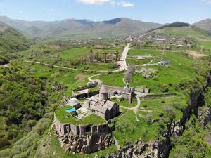 an aerial view of an old castle on a mountain at Armine B&B in Tatʼev