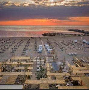 a view of a beach with a lot of parked cars at Villa 3 papuci in Constanţa +27 photos
