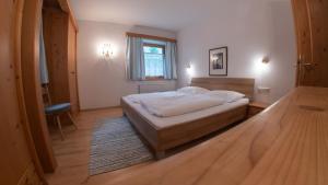 Postel nebo postele na pokoji v ubytování Haus Christophorus